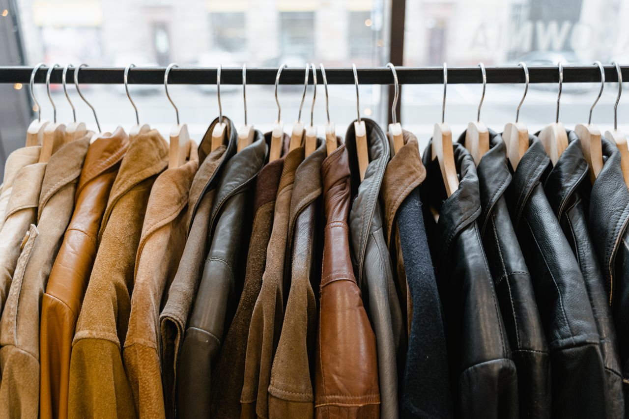 Crafting Captivating Headlines: Your awesome post title goes here A collection of leather and suede jackets hanging on a clothes rack in a stylish boutique.